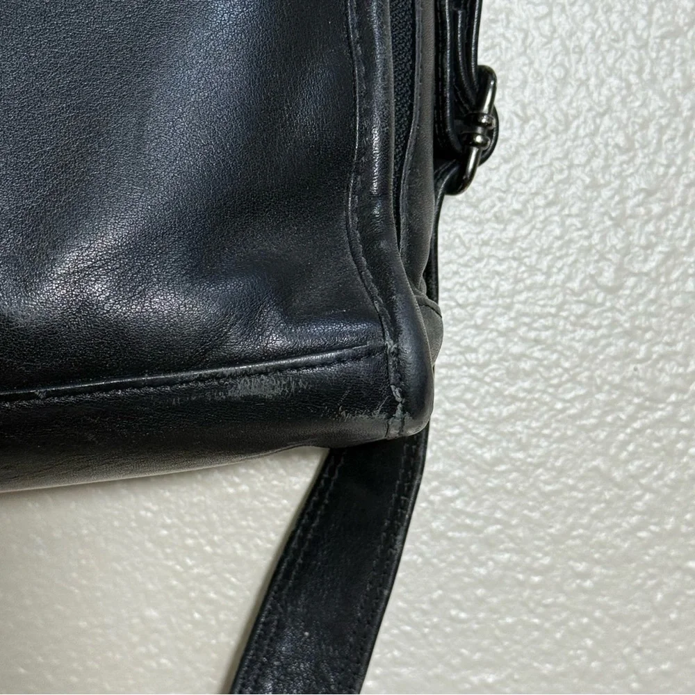 Tumi black leather